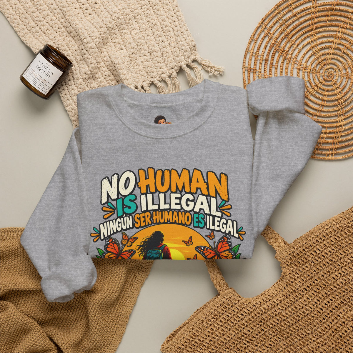 No Human Is Illegal Sweatshirt — Bilingual Immigrant Rights