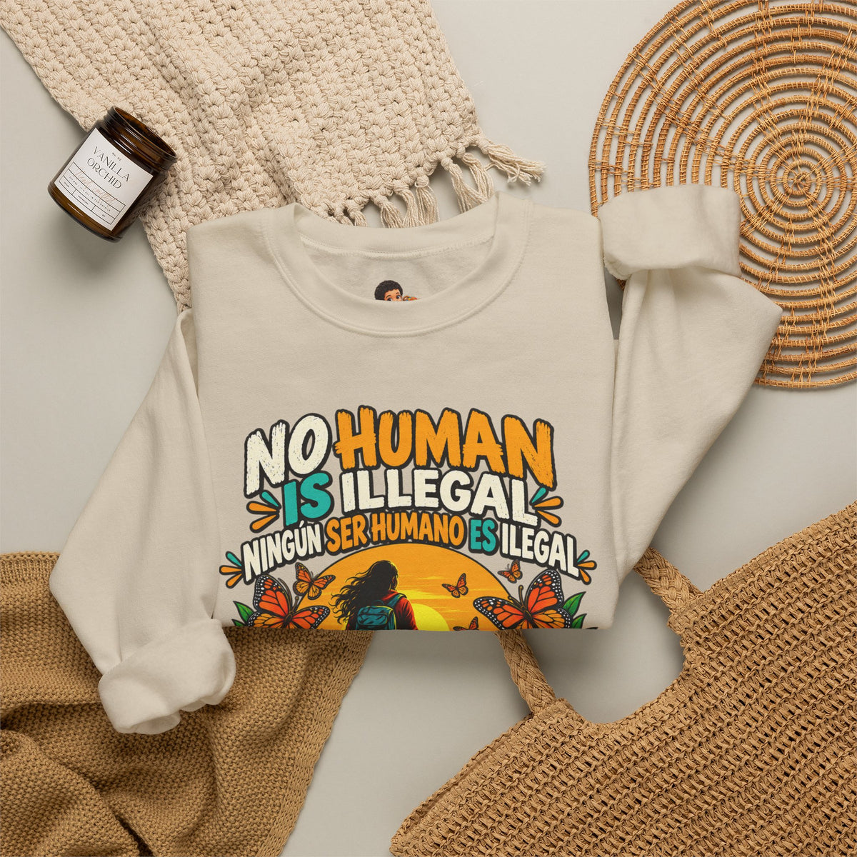 No Human Is Illegal Sweatshirt — Bilingual Immigrant Rights