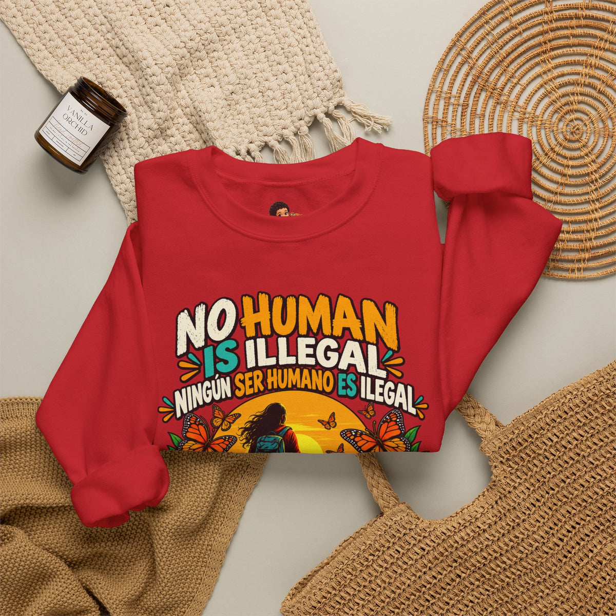 No Human Is Illegal Sweatshirt — Bilingual Immigrant Rights