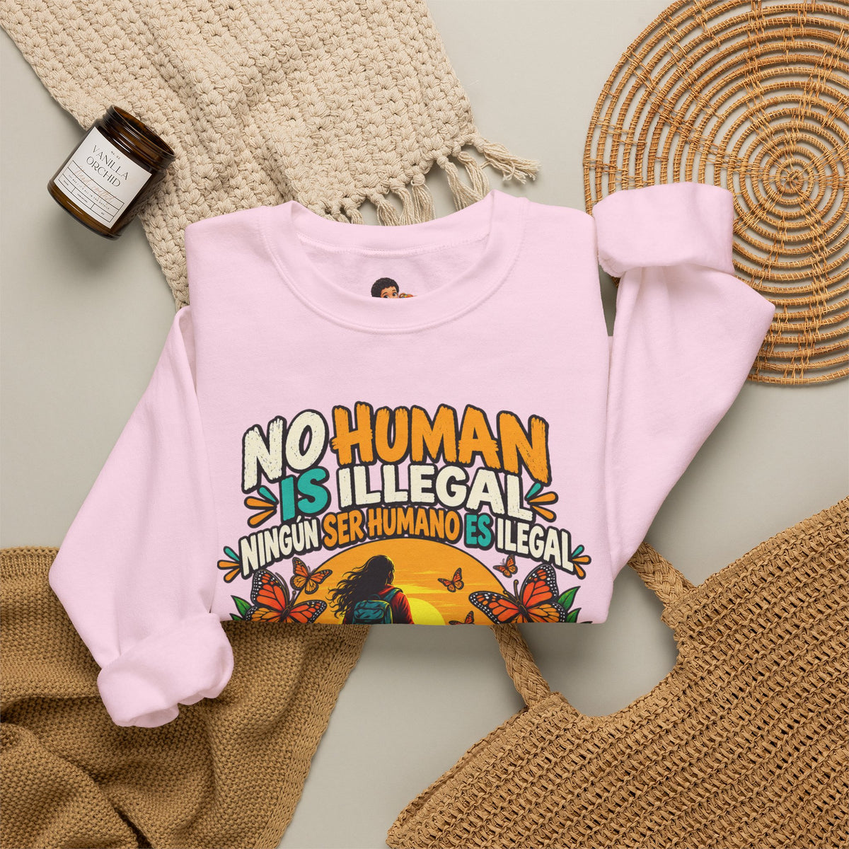 No Human Is Illegal Sweatshirt — Bilingual Immigrant Rights